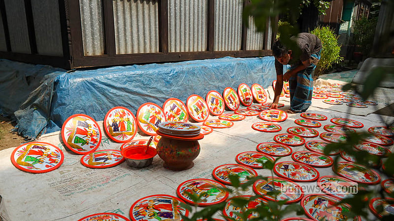 Rows of colourful clay discs brighten a courtyard in Sirajdikhan’s Palpara in Munshiganj.  Photo: Shamsul Haque Ripon