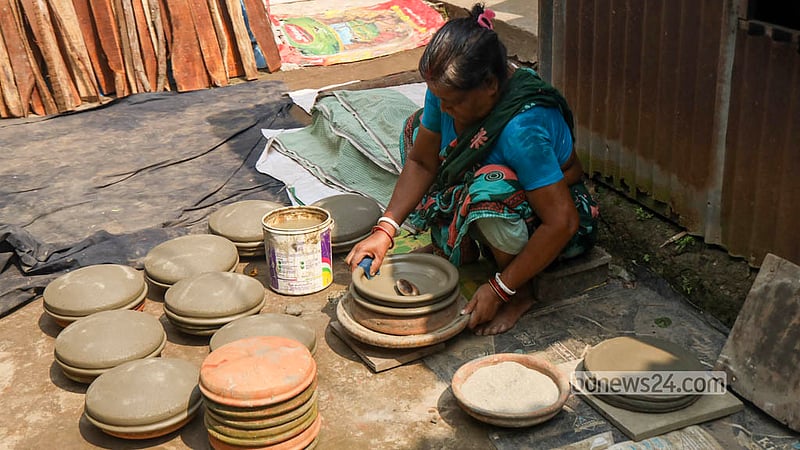 A potter shapes earthenware from clay in Sirajdikhan’s Palpara in Munshiganj.  Photo: Shamsul Haque Ripon