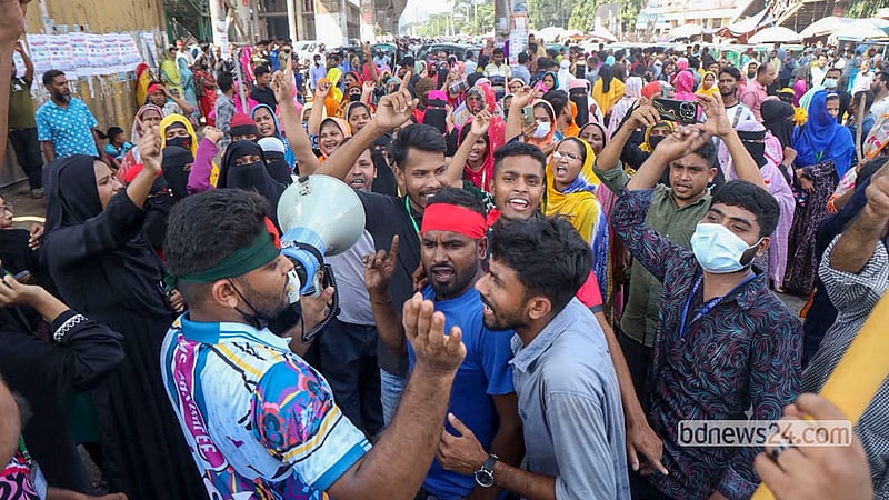 Workers from several garment factories protest by blocking a highway in Dhaka’s Uttara on Wednesday, Oct 14, 2026. Photo: Shamsul Haque Ripon