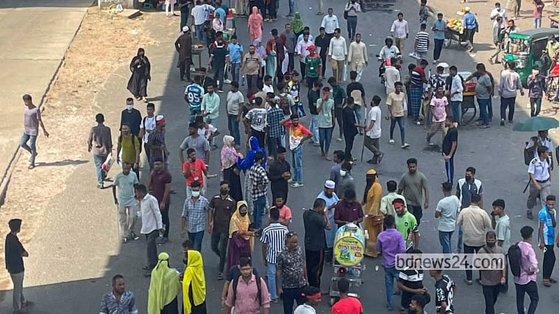 Workers from several garment factories protest by blocking a highway in Dhaka’s Uttara on Wednesday, Oct 14, 2026. Photo: Shamsul Haque Ripon