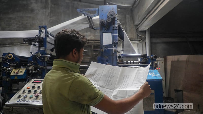 Secondary-level textbooks for the 2027 academic year roll off the presses at Bright Printing Press in Dhaka’s Matuail. The facility is set to produce approximately 3.7 million books. Photo: Abdullah Al Momin