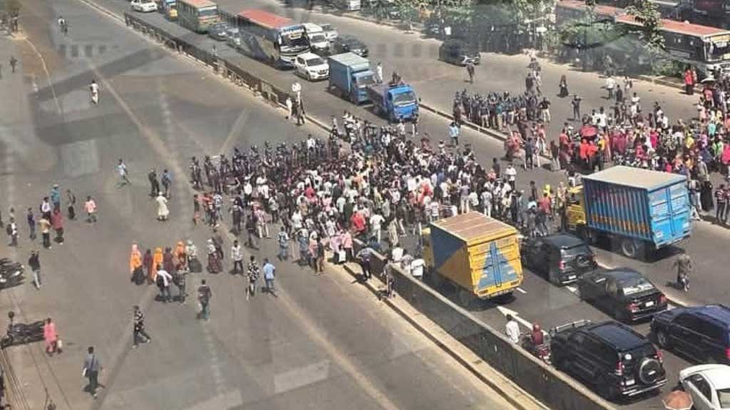 Garment workers block road in Uttara for third day
