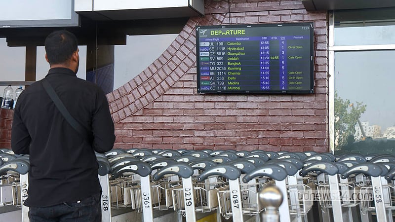 Direct flights on the Jeddah and Madinah routes are still running for the convenience of expatriates. Passengers are relieved to see the regularly scheduled Saudi Airlines to the destinations and the “Gate Open” message on the flight information display board outside the departure terminal at Dhaka's Shahjalal Airport. Photo: Shamsul Haque Ripon