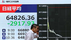 Asian markets sell off as AI trades crumble