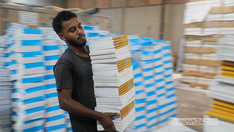 Newly printed secondary-level textbooks are readied for delivery from Matuail to schools across the country. Photo: Abdullah Al Momin