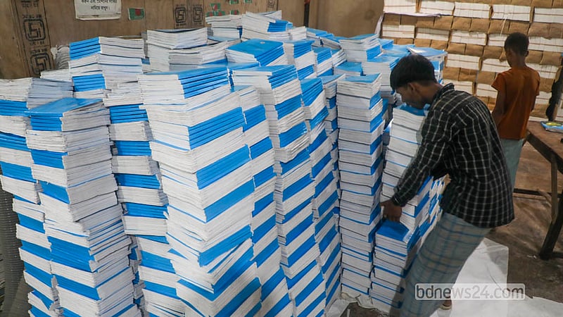 Stacks of freshly printed secondary-level textbooks await distribution at Bright Printing Press in Dhaka’s Matuail, ready to make their way to schools across the country. Photo: Abdullah Al Momin