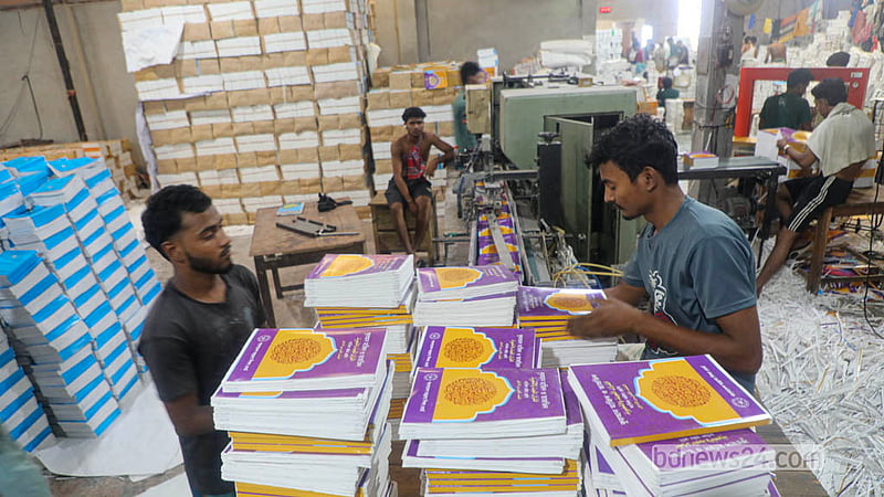 Workers are busy printing textbooks at a printing press in Dhaka’s Matuail. Photo: Abdullah Al Momin