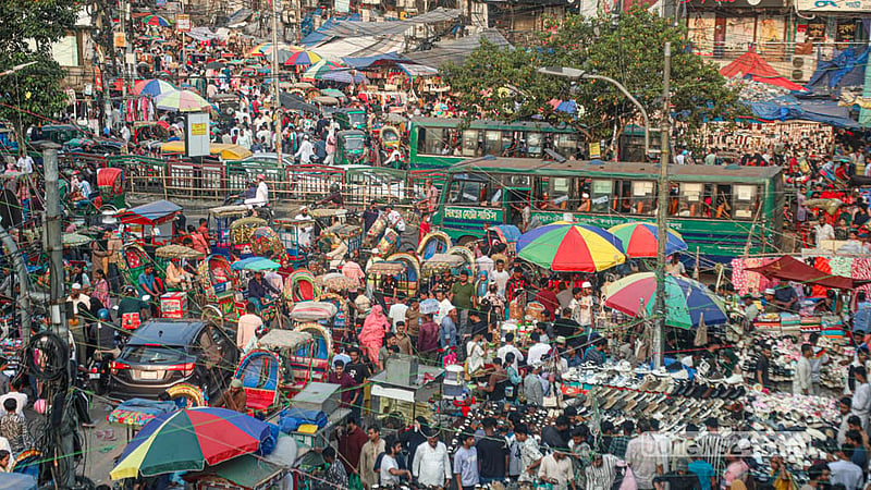 Hawkers occupy roads and footpaths in Dhaka's New Market area with little regard for the suffering it can cause to pedestrians, commuters and locals. Photo: Abdullah Al Momin