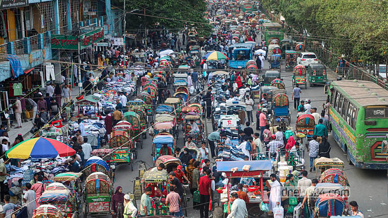 Hawkers have occupied roads and footpaths in Dhaka's New Market area to set up stalls and sell a range of goods. The Dhaka South City Corporation had evicted hawkers from the area a few months ago. Photo: Abdullah Al Momin