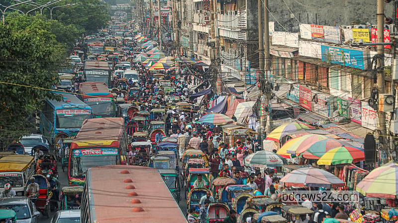 Mirpur Road is often gridlocked due to shops occupying the road and footpaths in Dhaka's New Market area. Photo: Abdullah Al Momin