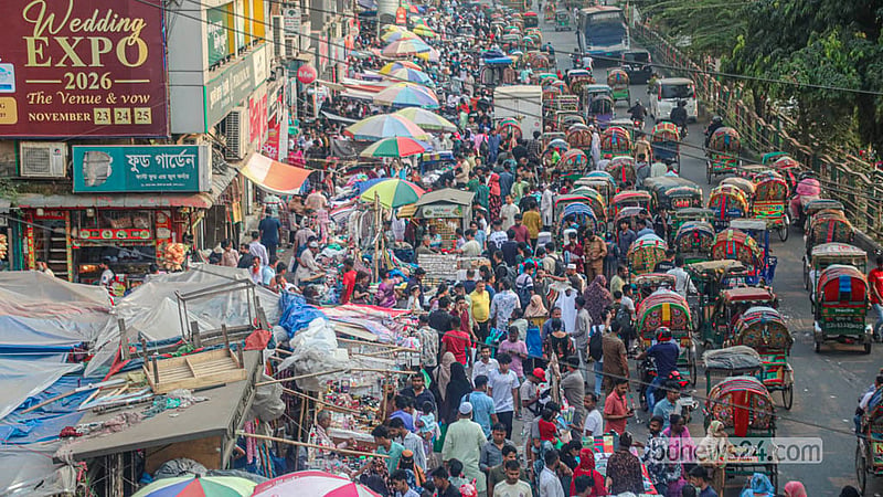In addition to taking up the footpath, hawkers also occupy a portion of the streets in Dhaka's New Market area. Photo: Abdullah Al Momin
