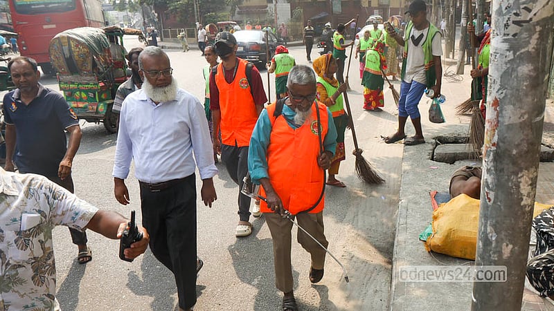 A team of cleaners takes part in a DSCC cleaning drive in Tikatuli on Saturday, Oct 17, 2026, as the city corporation steps up efforts to control dengue. Photo: Shamsul Haque Ripon