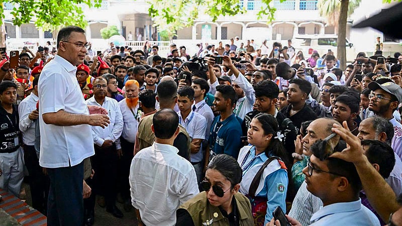 Prime Minister Tarique Rahman exchanges greetings with residents during a visit to the government officers’ and employees’ residential quarters in Dhaka’s Azimpur on Saturday, Oct 17, 2026. Photo: PMO