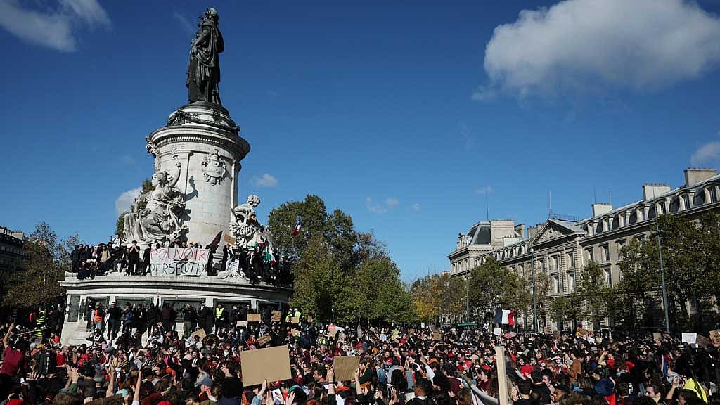 French protesters take to streets over rising prices and social strain