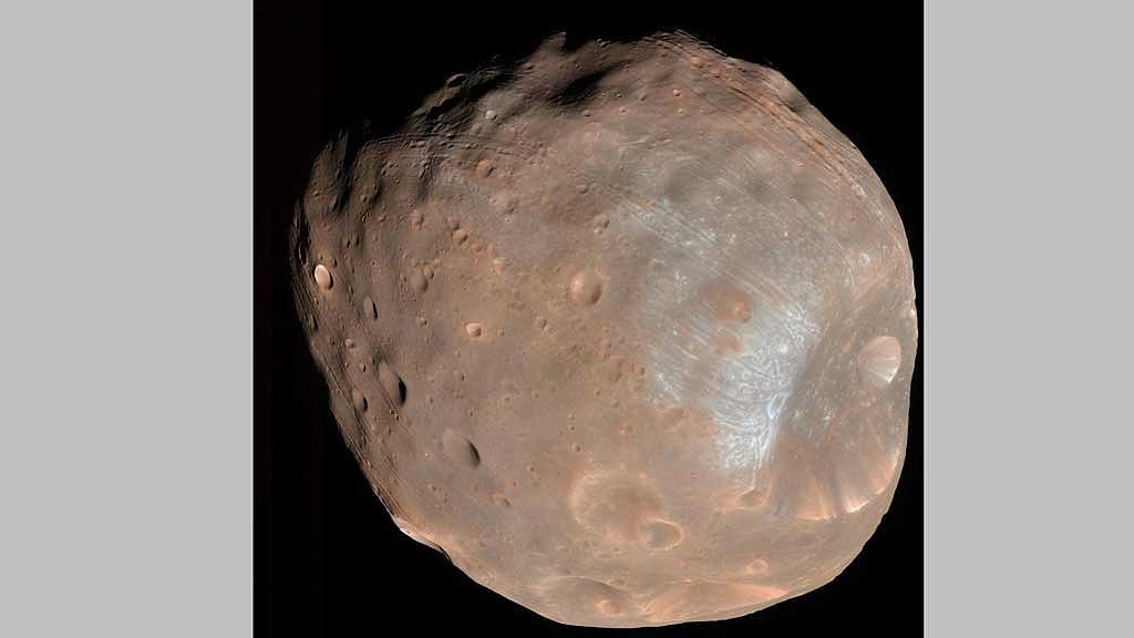 Japan prepares world-first mission to collect and return samples from Martian moon