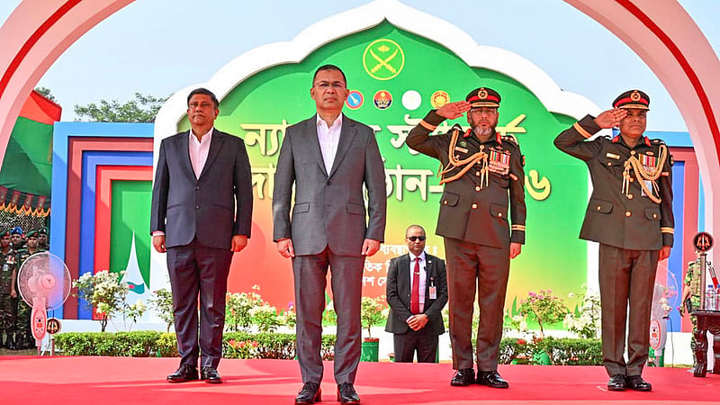 Prime Minister Tarique Rahman takes the salute at a parade marking the National Standard presentation ceremony at Savar Cantonment on Sunday, Oct 18, 2026. Photo: PID