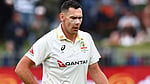 Boland strikes twice on rain-hit first day
