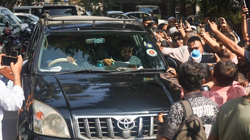 Dhaka-6 MP Ishraque Hossain is surrounded by hundreds of party leaders and activists as he leaves the National Press Club after announcing his resignation on Monday, Oct 19, 2026. Photo: Shamsul Haque Ripon