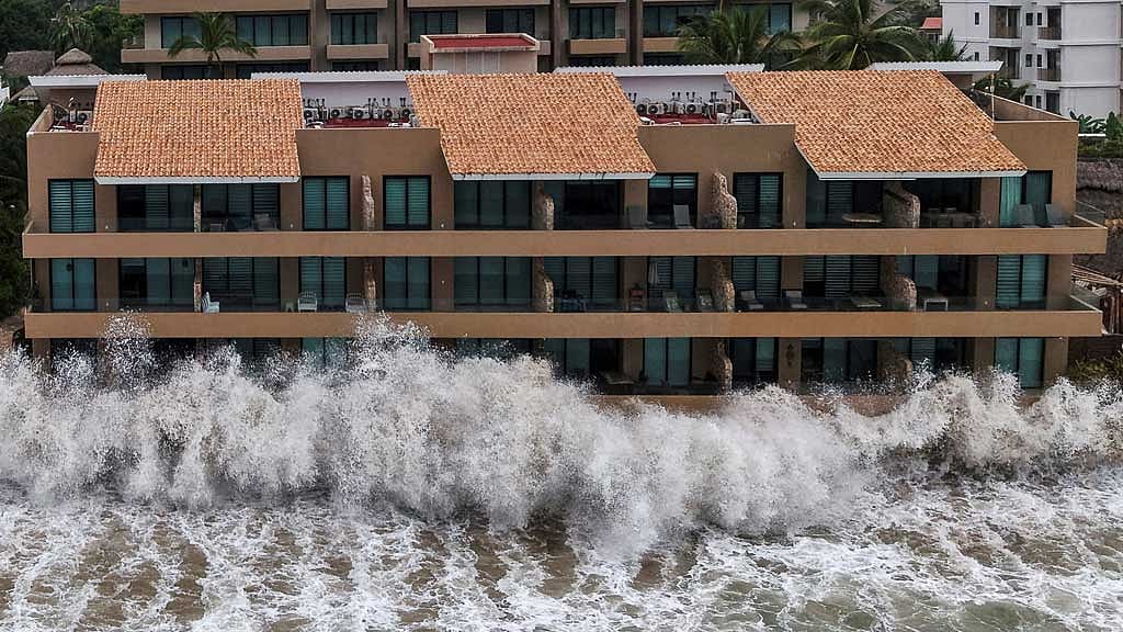 Hurricane Trudy weakens off Mexico's Pacific coast as cleanup effort begins