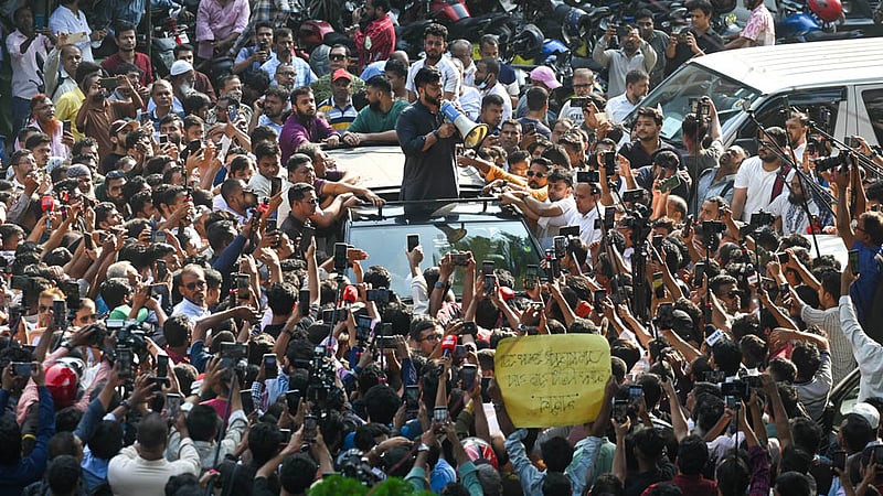 Ishraque Hossain addresses party leaders and activists with a handheld megaphone outside the National Press Club after announcing his resignation amid controversy over the armed “anti-drug drive”. Photo: Shamsul Haque Ripon