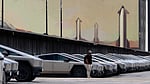 Wall St backs Tesla-SpaceX deal, Musk cautious