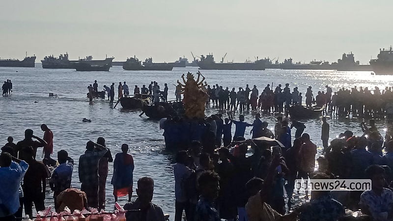 Crowds of Hindu devotees gather at Patenga Beach in Chattogram for the immersion of Durga idols on Bijoya Dashami, Oct 21, 2026.