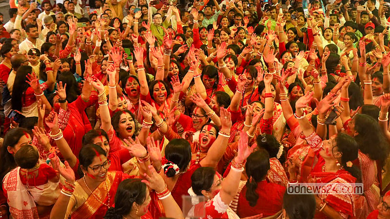 Women celebrate Sindoor Khela at Dhakeshwari National Temple on Wednesday, ahead of the immersion of Goddess Durga's idol. Photo: Shamsul Haque Ripon