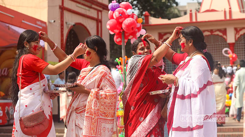 Women celebrate Sindoor Khela at Dhakeshwari National Temple on Wednesday, ahead of the immersion of Goddess Durga's idol. Photo: Shamsul Haque Ripon