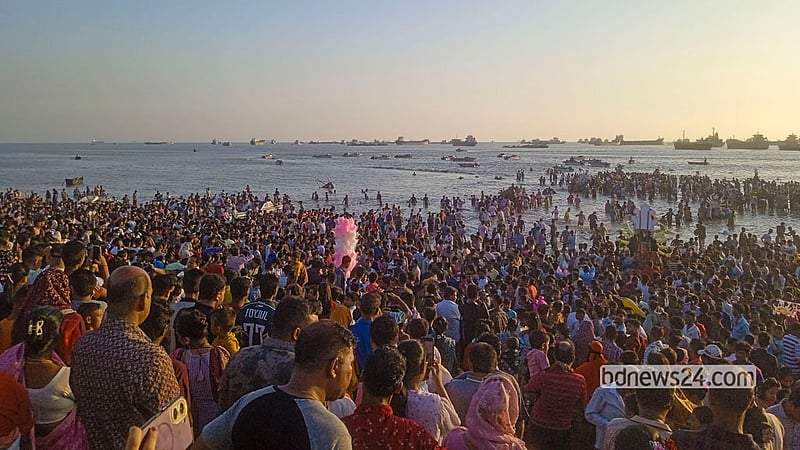 Crowds of Hindu devotees gather at Patenga Beach in Chattogram for the immersion of Durga idols on Bijoya Dashami, Oct 21, 2026.