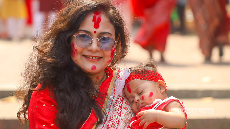 Children join married women in the Sindoor Khela celebrations at Dhakeshwari National Temple. Photo: Shamsul Haque Ripon