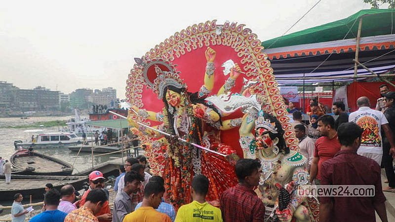 Durga idols arrive at Wais Ghat in Dhaka ahead of their immersion in the Buriganga River. Photo: Abdullah Al Momin