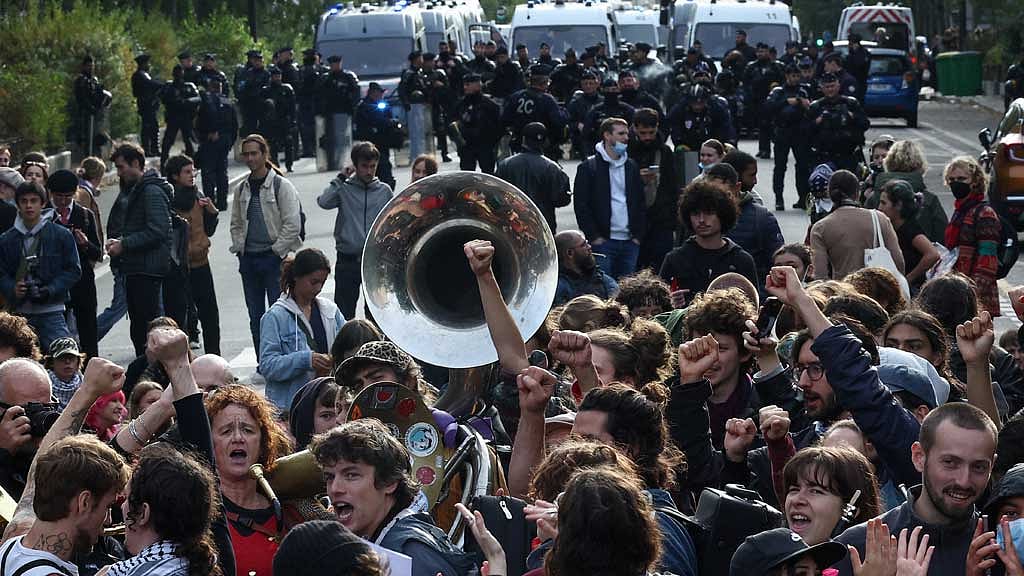 France's Macron tightens curbs on protests, blaming hard left for unrest