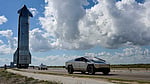 Tesla cuts spending before potential SpaceX deal