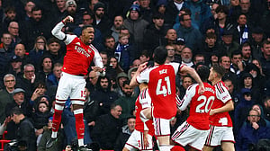 Arsenal join Man City at top