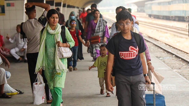 Scores of people walk along the platform at Kamalapur Railway Station after arriving in Dhaka by train on Saturday, Oct 24, 2026, following five days of holiday. Photo: Shamsul Haque Ripon