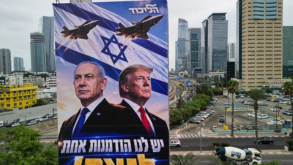 Netanyahu touts Trump endorsement on eve of vote, suggests they may restart war on Iran