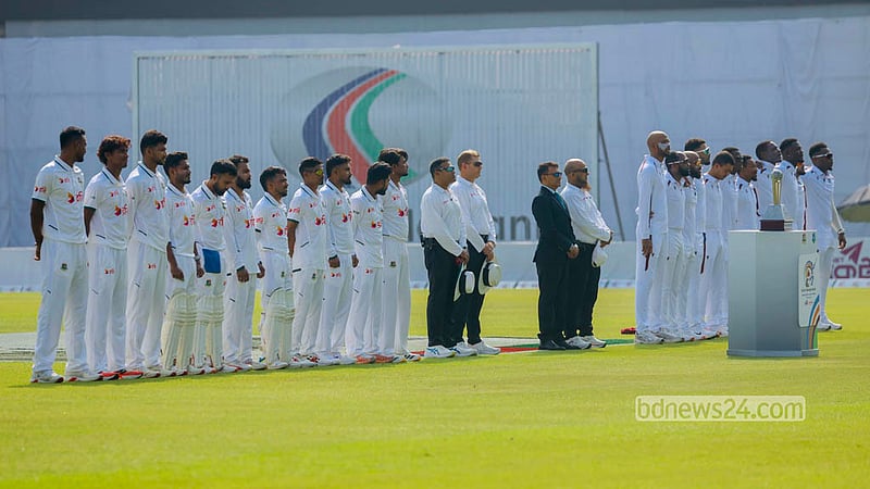Players from Bangladesh and West Indies stand in lines at opposite ends of the Sher-e-Bangla National Cricket Stadium in Mirpur, singing their national anthems before the Test begins. Photo: Shamsul Haque Ripon