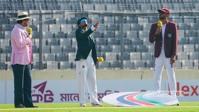 Bangladesh captain Najmul Hossain Shanto wins the toss and elects to bat, with West Indies skipper Roston Chase standing beside him at the start of the Mirpur Test. Photo: Shamsul Haque Ripon