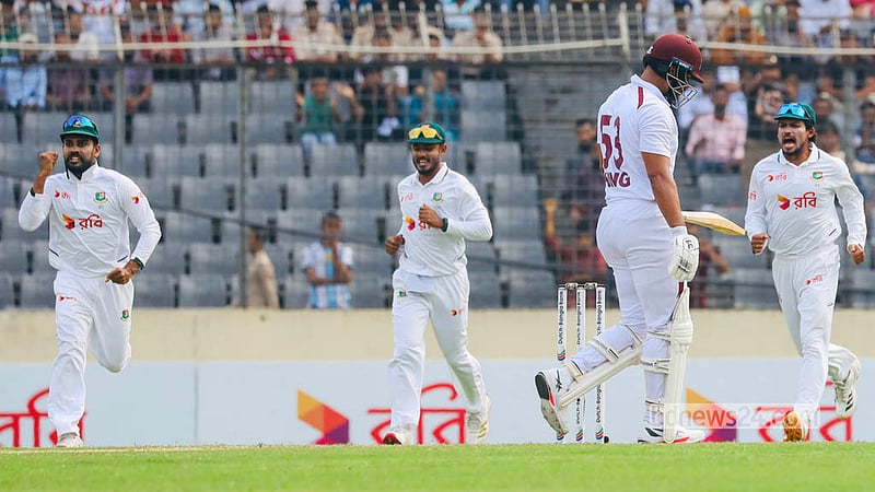 
Bangladesh players celebrate after dismissing a West Indies opener on the second day of the Mirpur Test. Photo: Shamsul Haque Ripon
