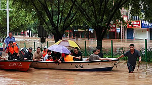 Homes submerged, tens of thousands relocated in China's south as flooding intensifies