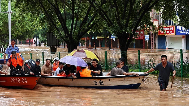 Homes submerged, tens of thousands relocated in China's south as flooding intensifies