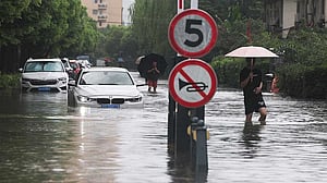 Storms from Dolphin soak China's east, ground nearly 950 Shanghai flights