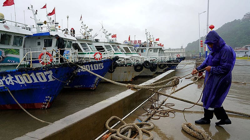 Japan orders evacuations as Typhoon Dolphin approaches, cancels 500 flights