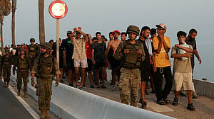 Italy to ask for EU-funded migrant centres at emergency EU talks on Ceuta