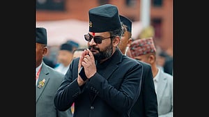 Nepal parliament bans dark glasses, but PM Shah keeps his on