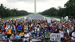 Thousands march in Washington as leaders warn of voting and civil rights rollbacks