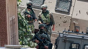 Israeli troops round up Palestinians in West Bank village after shootout involving settlers