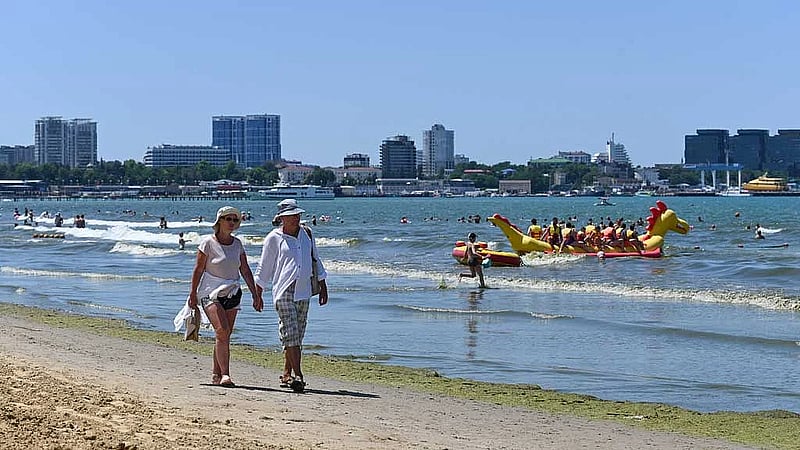 Even at the beach, it's hard for Russians to escape the war