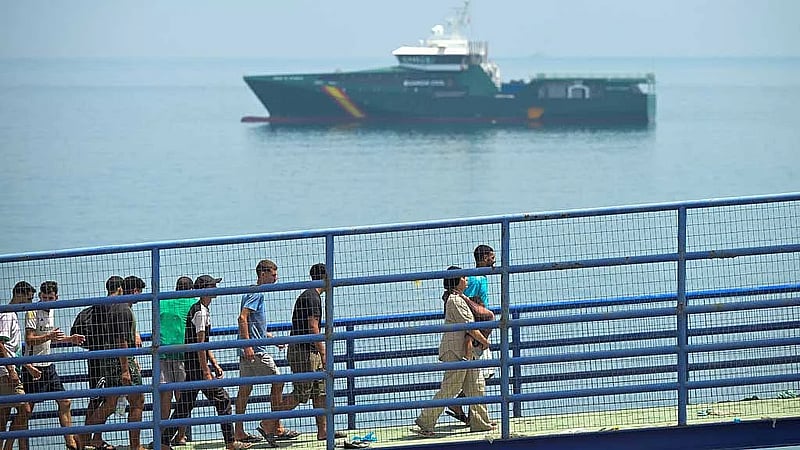 Spain says huge surge across border into enclave has reversed, half of migrants go back
