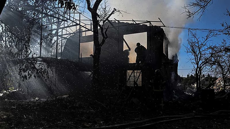 Russian and Ukrainian attacks kill at least 13, officials say